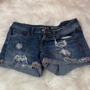 Distressed Mid-Rise Denim Shorts in Dark Blue